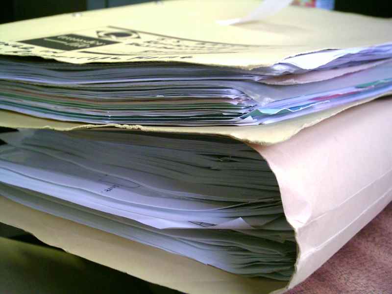 Manilla folder containing paper documents